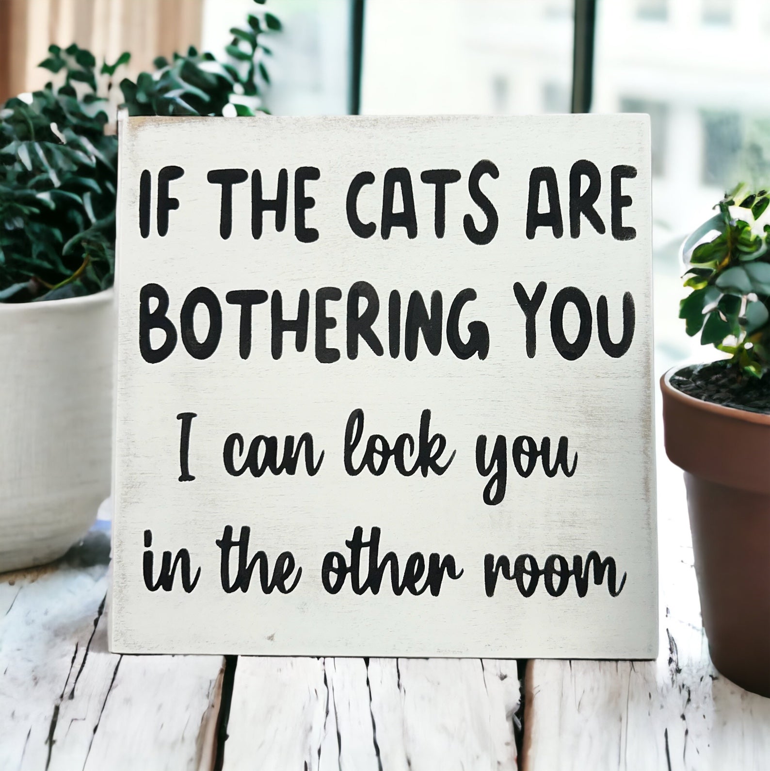 "Cats bothering you" funny wood sign