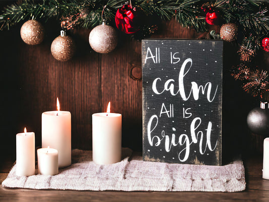 "Calm and bright" wood sign