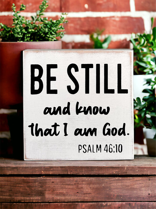 "Be still" wood sign