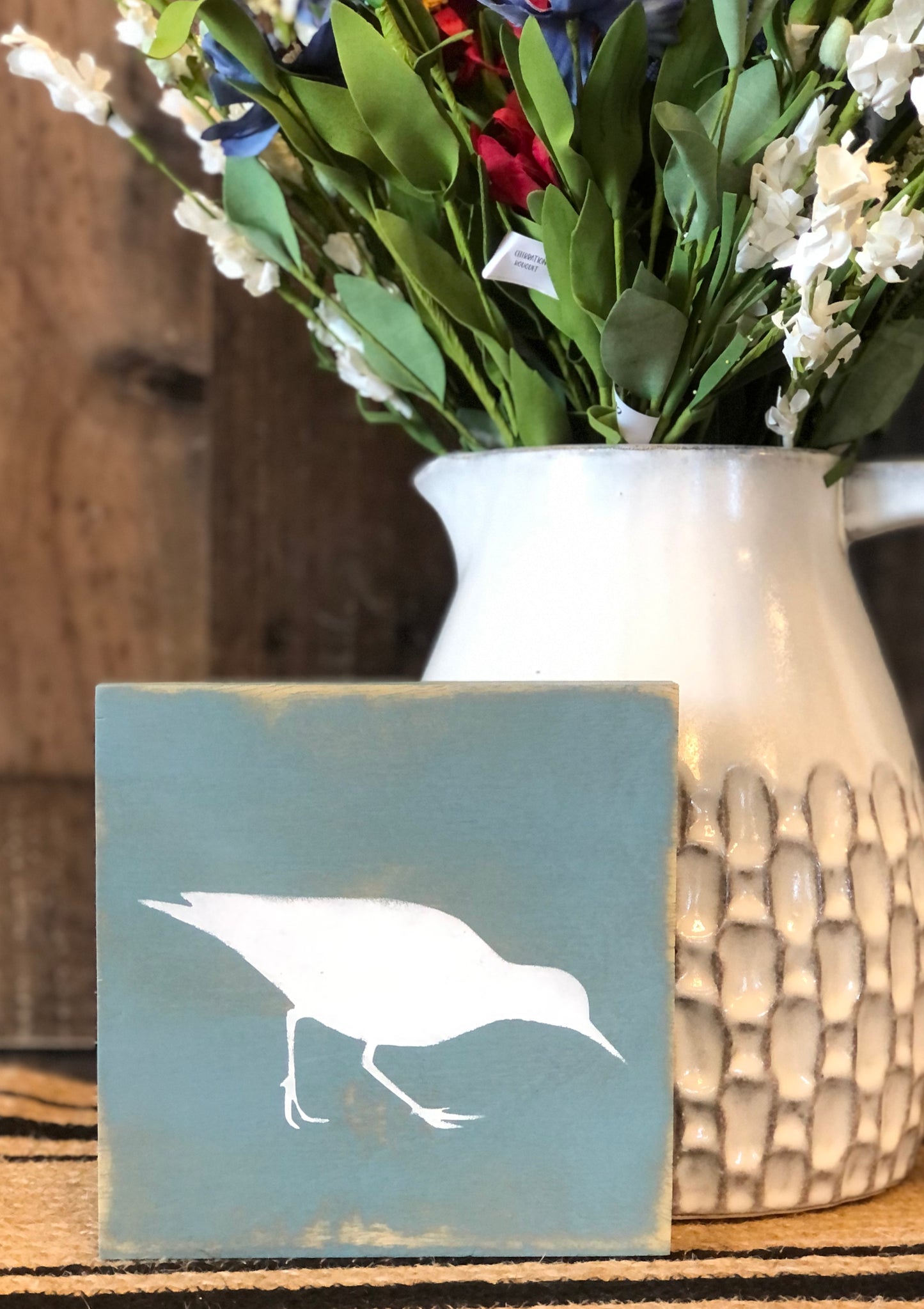 White bird wood sign