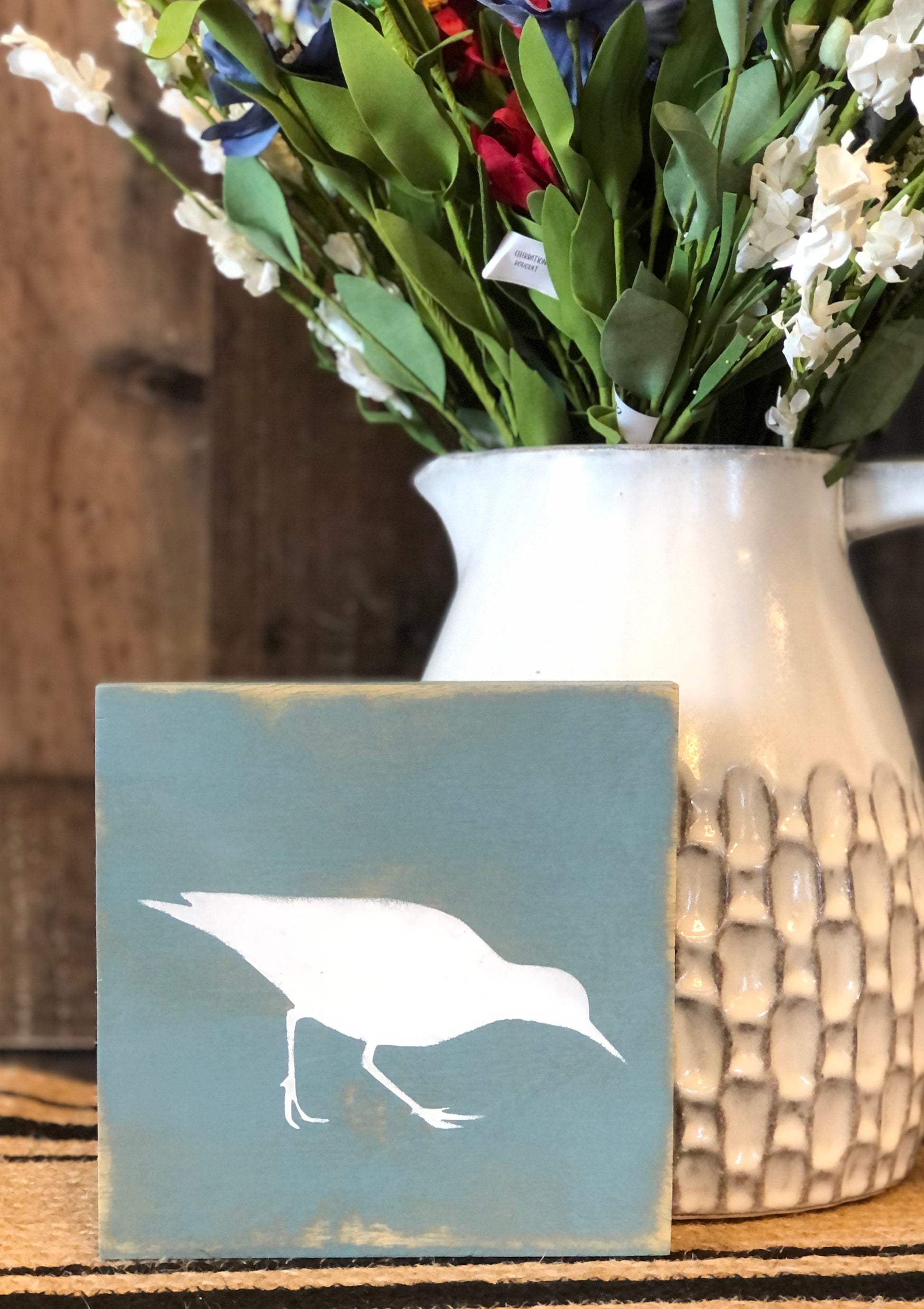 White bird wood sign