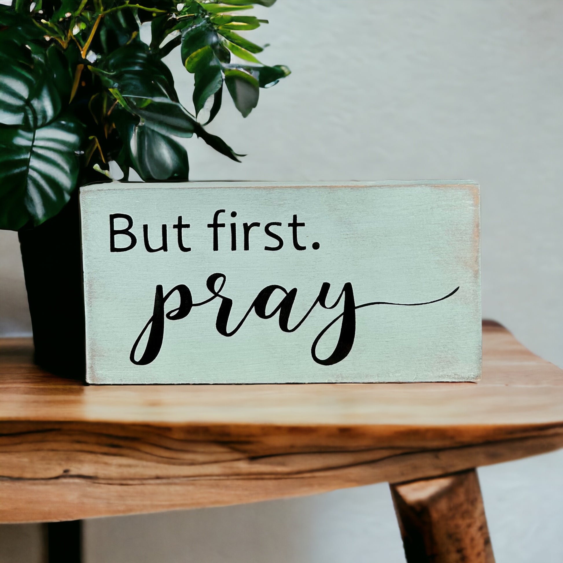 "But first, pray" wood sign