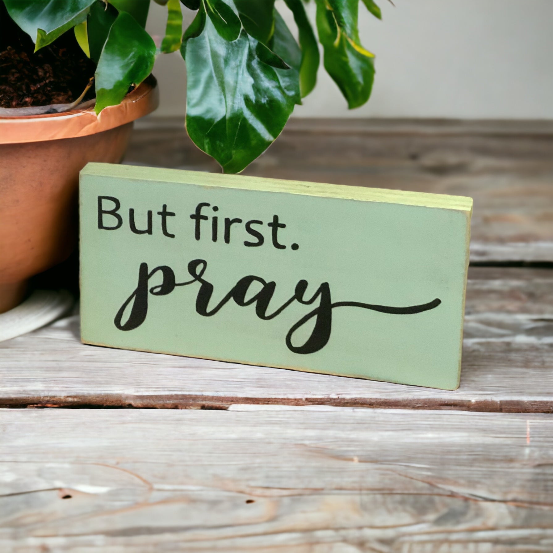 "But first, pray" wood sign
