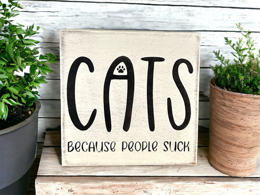 "Cats becasue people suck" wood sign