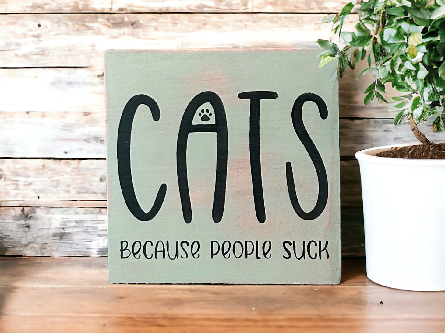 "Cats becasue people suck" wood sign