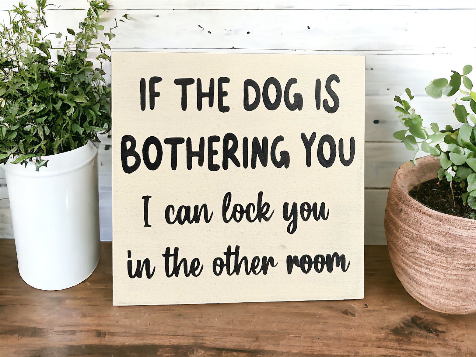 "Dogs because people suck" wood sign