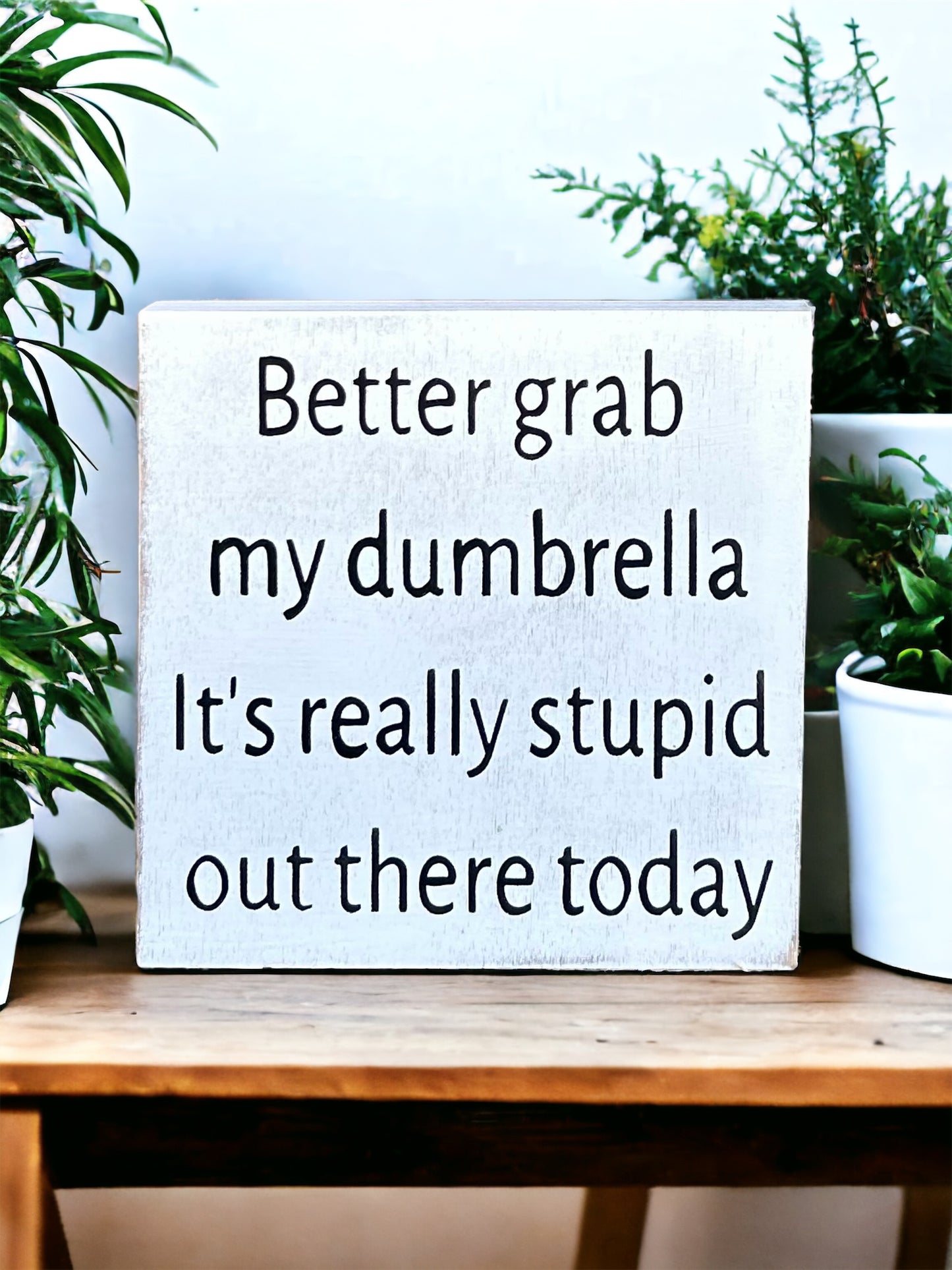 "Dumbrella" wood sign