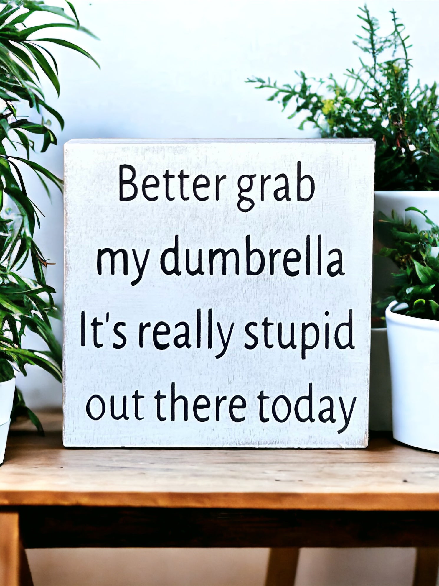 "Dumbrella" wood sign