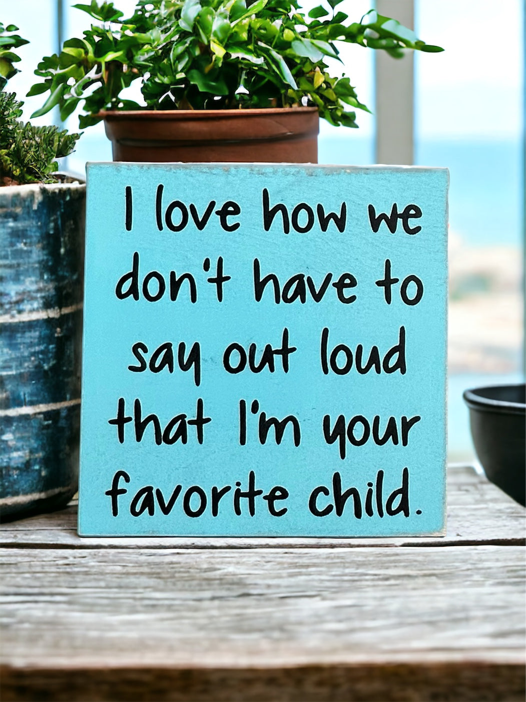 "Favorite child" wood sign