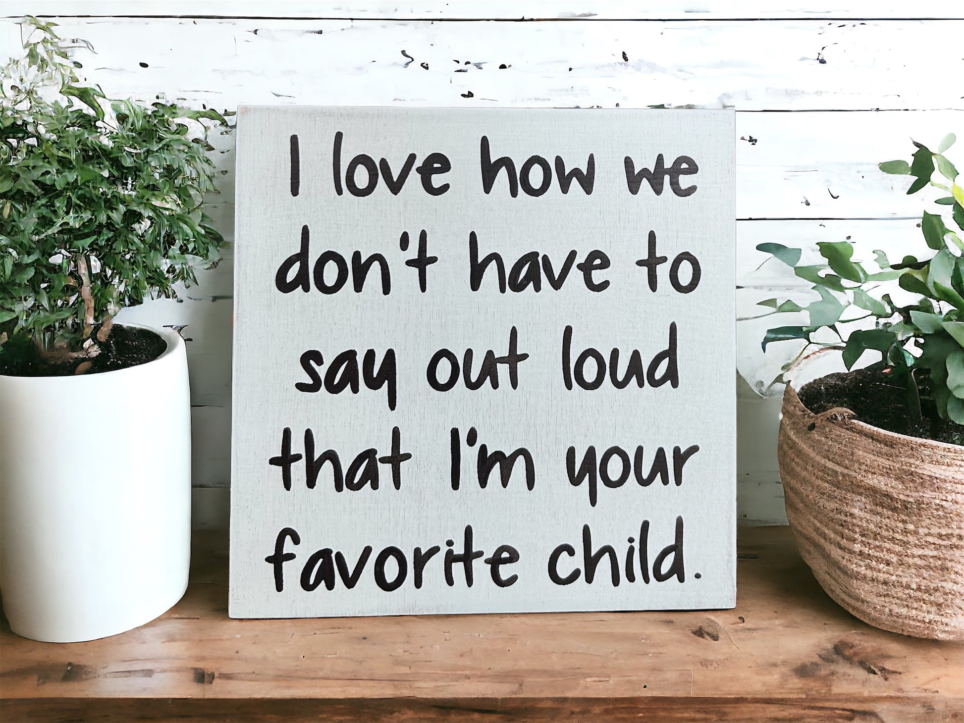 "Favorite child" wood sign