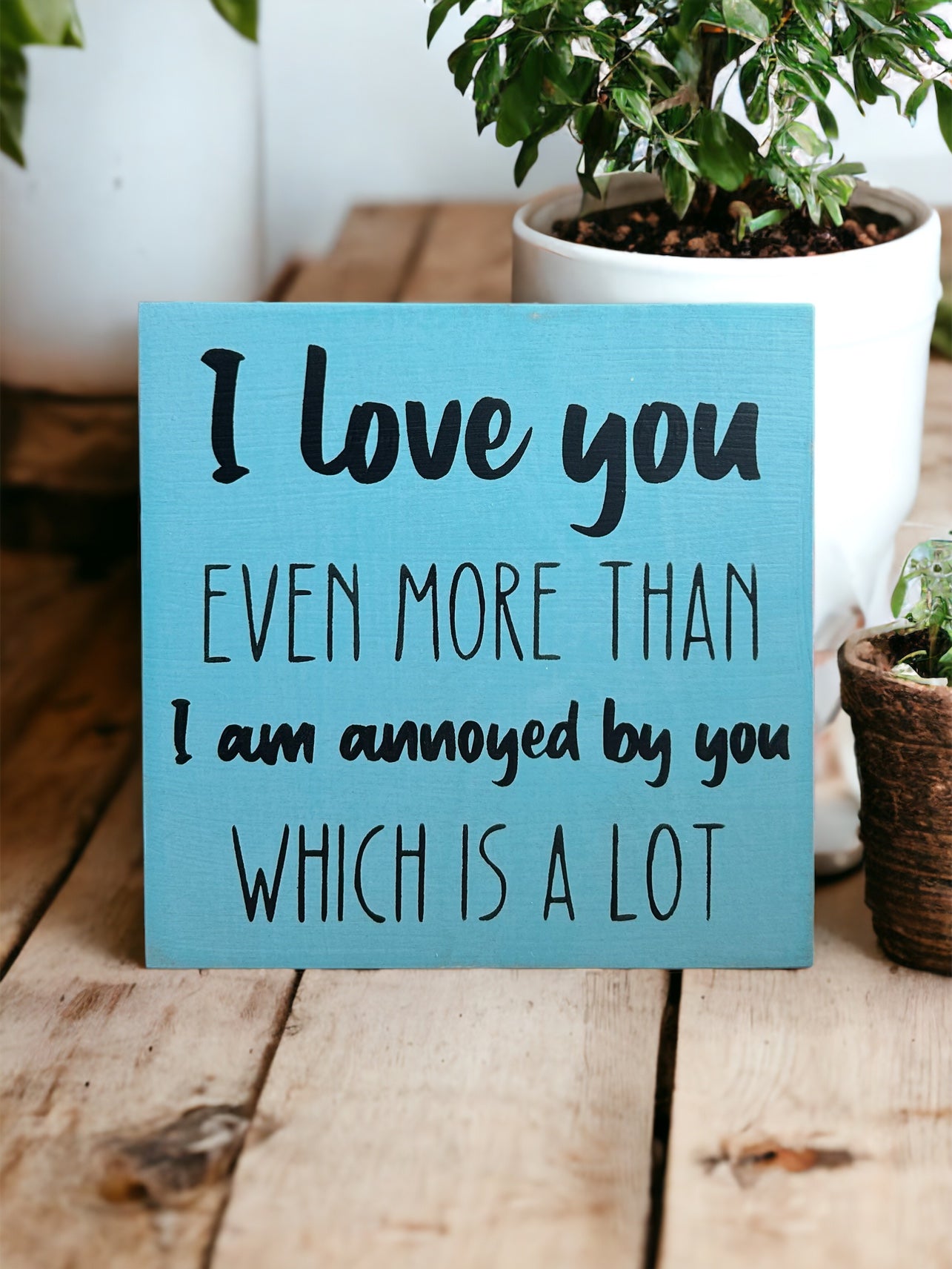 "I love you more" funny wood sign