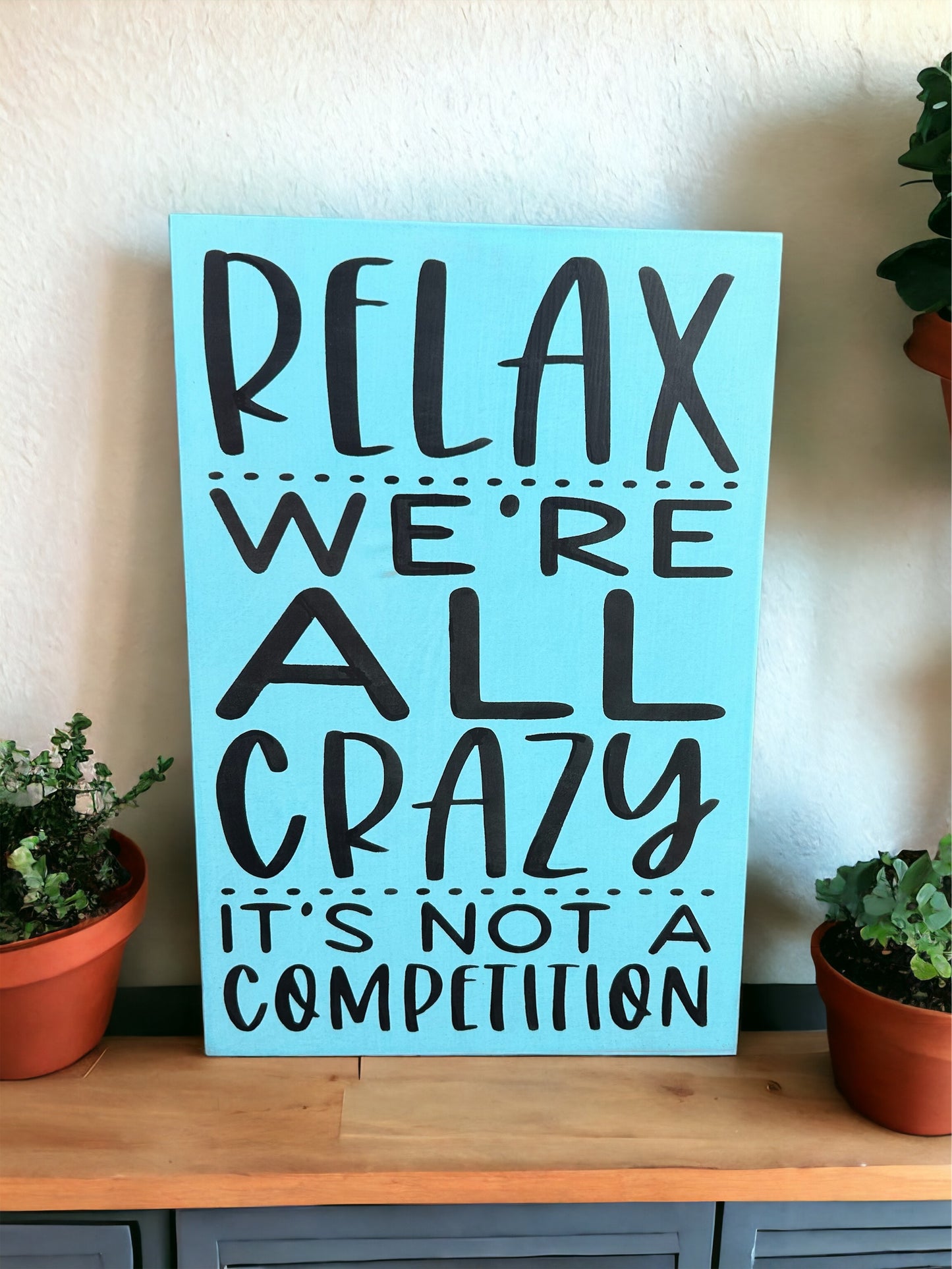 "We're all cazy" funny wood sign