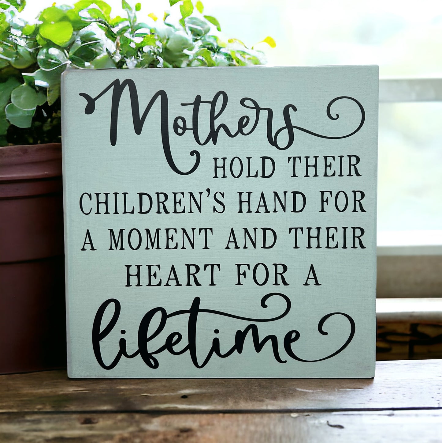 Mothers Hold Their Children’s Hand - Rustic Wood Sign