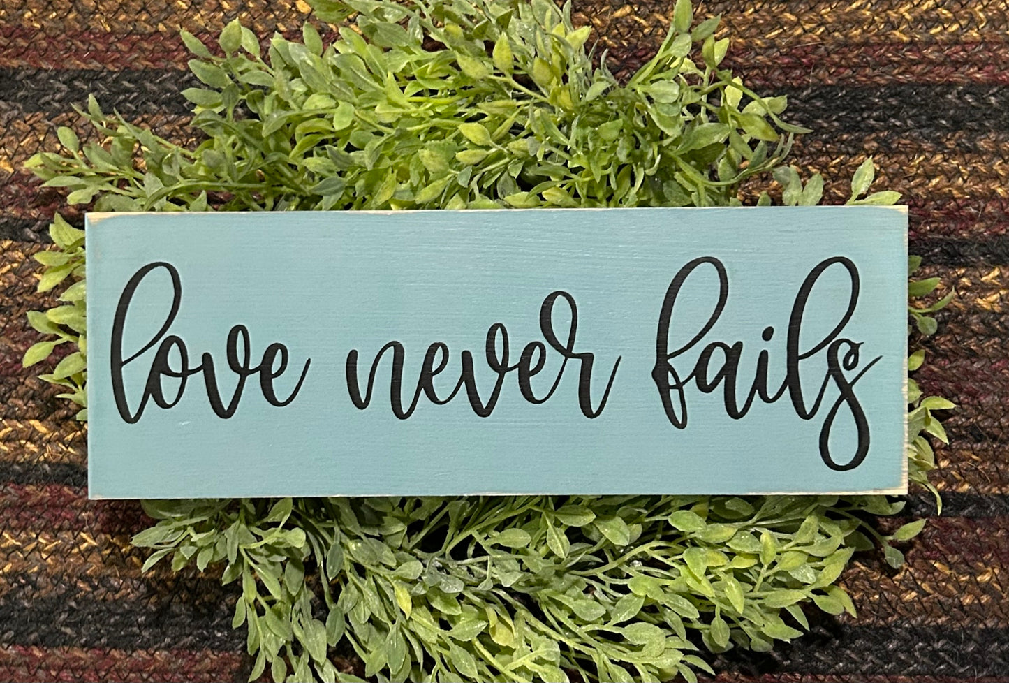Love Never Fails - Rustic Wood Sign