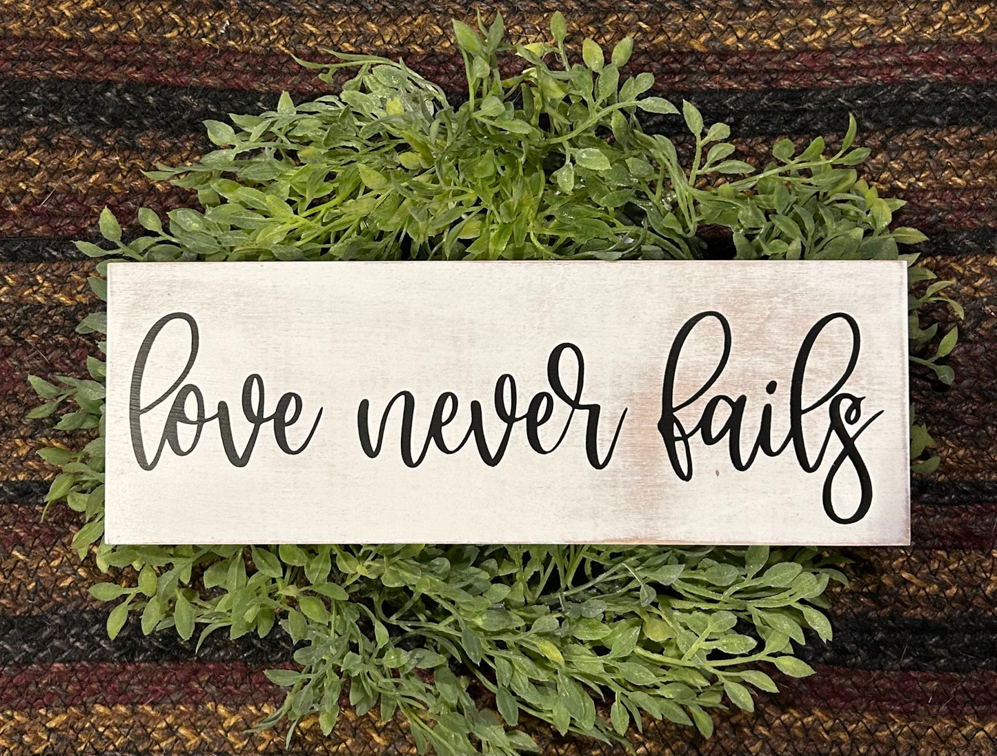 Love Never Fails - Rustic Wood Sign