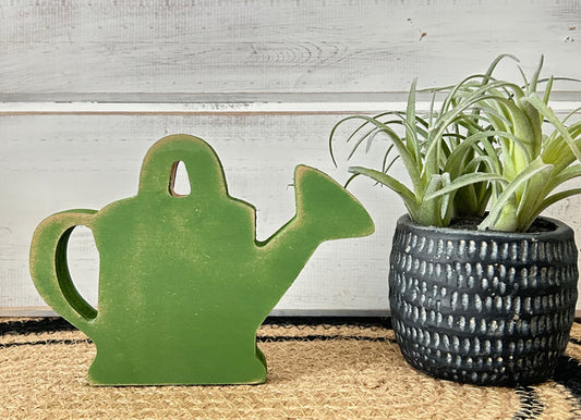 wood watering can