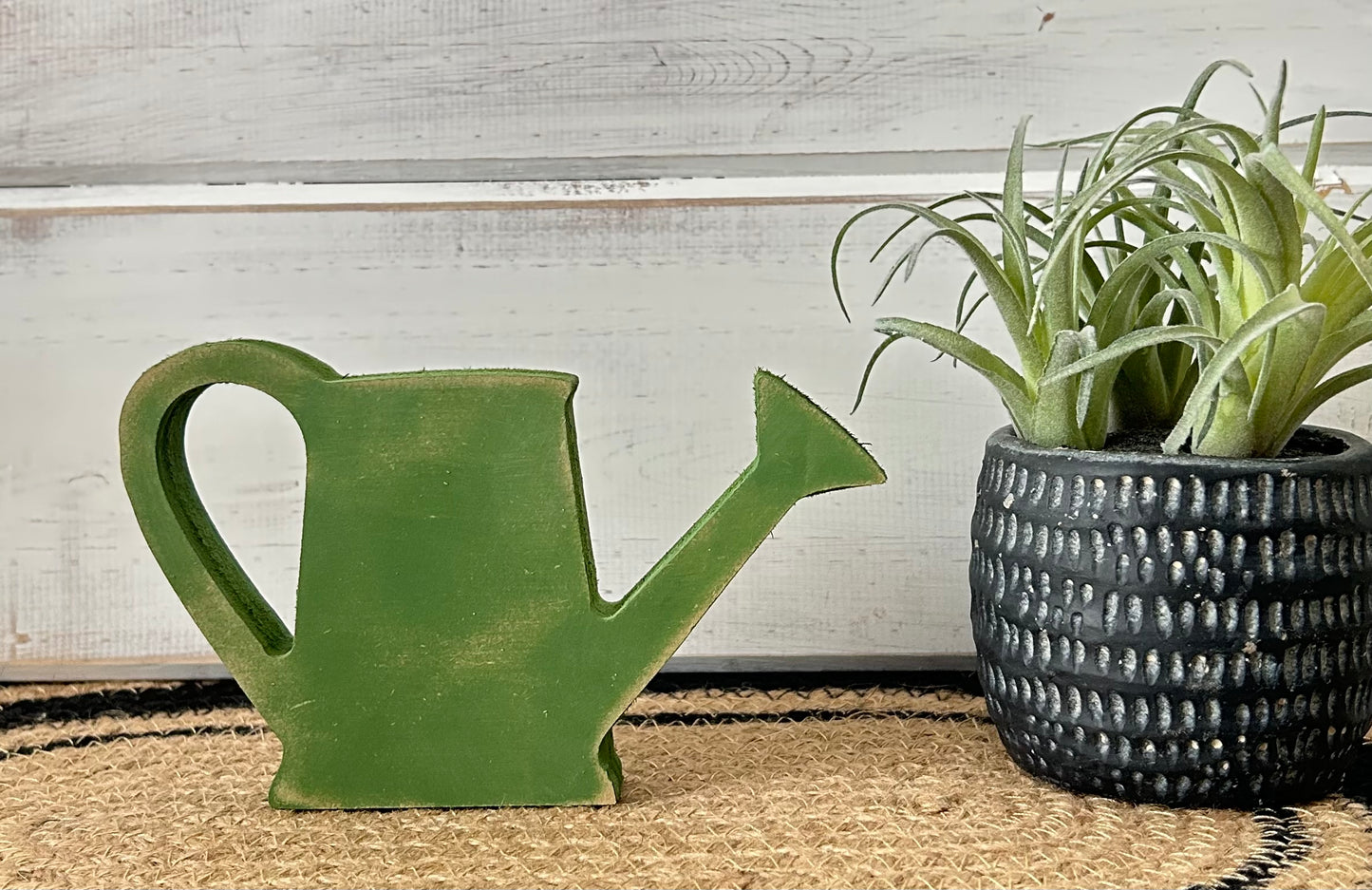 wood watering can