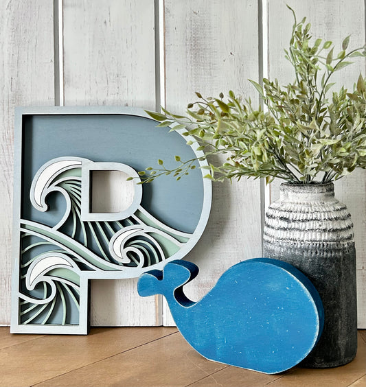 "P" layered wood decor