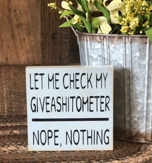 "Giveashitometer" wood sign