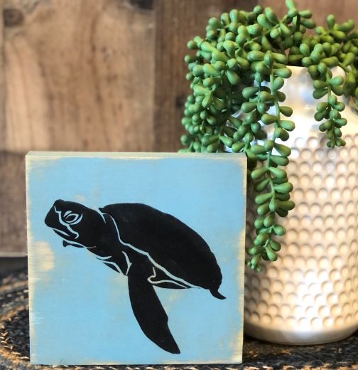 blue and black tutle sign