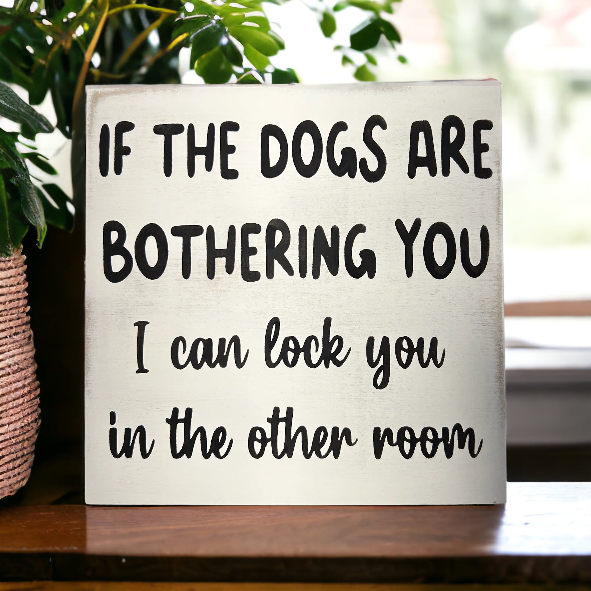 "dogs bothering you" funny wood sign