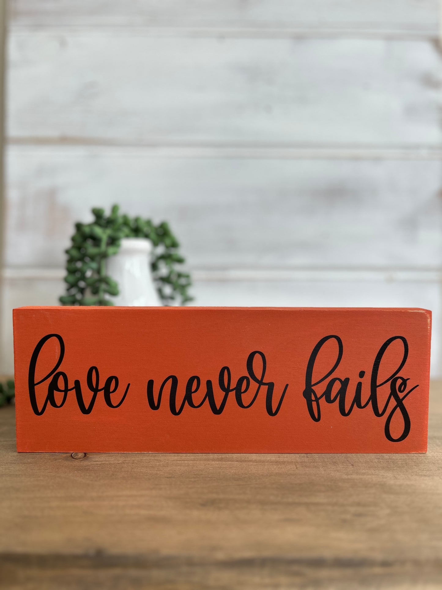 Love Never Fails - Rustic Wood Sign