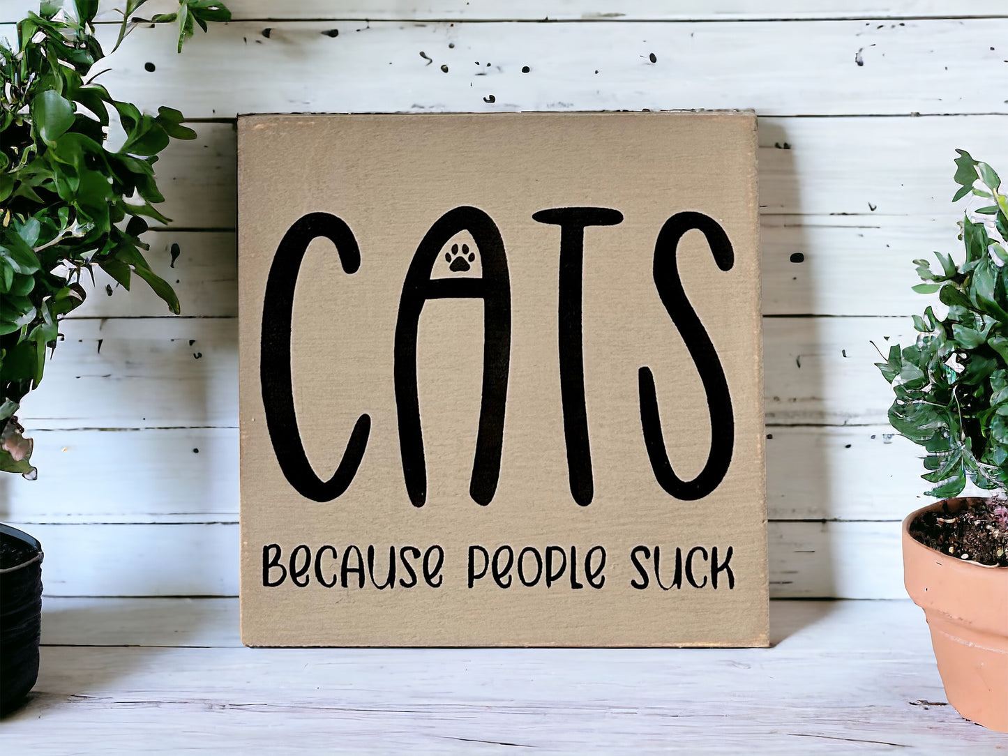 "Cats becasue people suck" wood sign