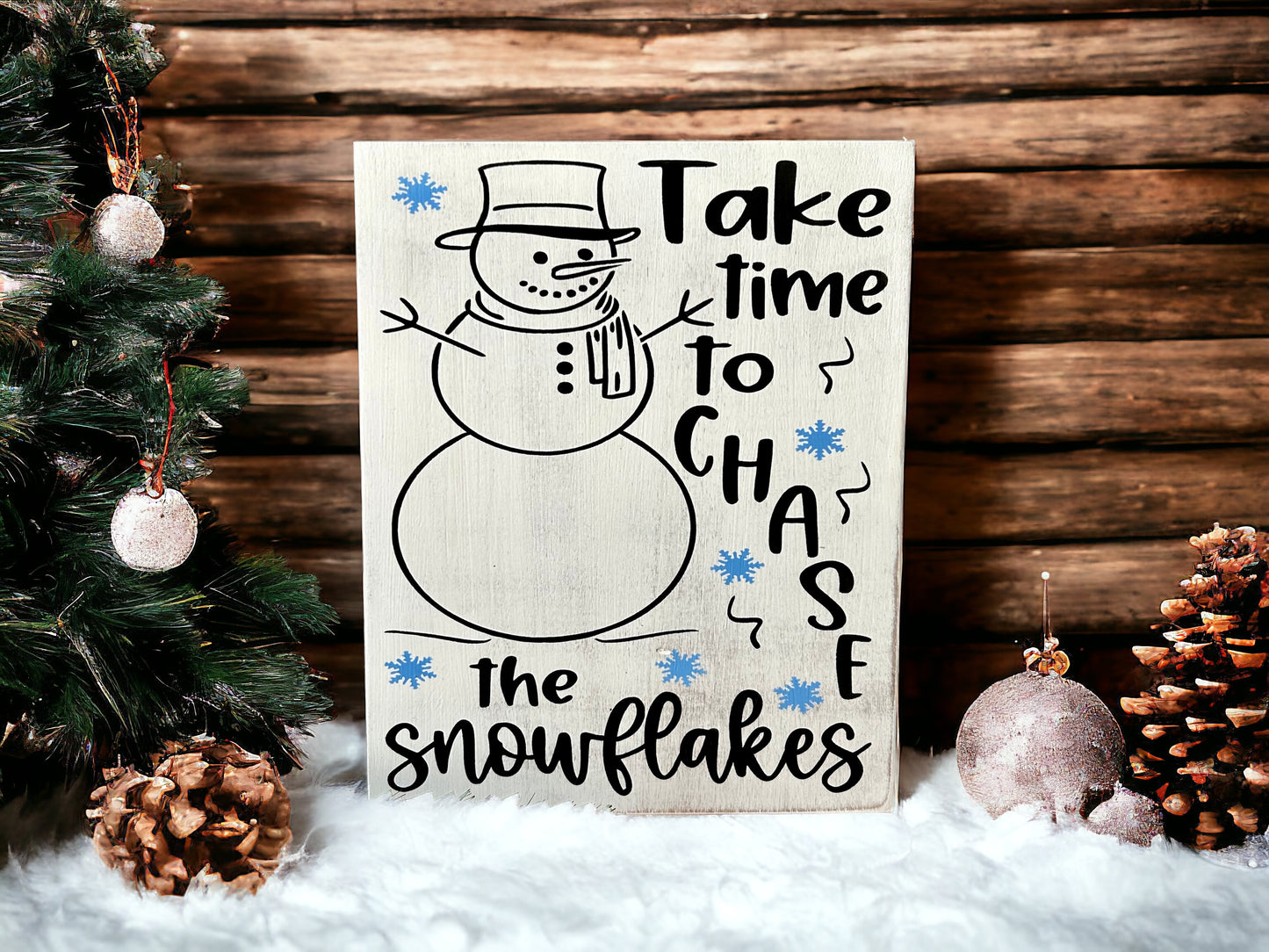 "Chase snowflakes" wood sign