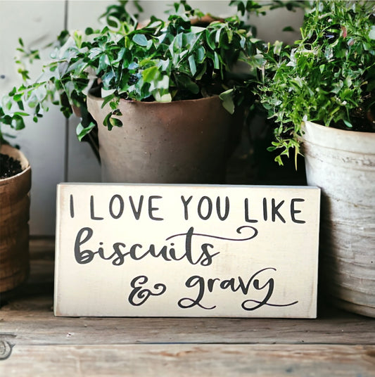 "Love you like biscuits and gravy" wood sign
