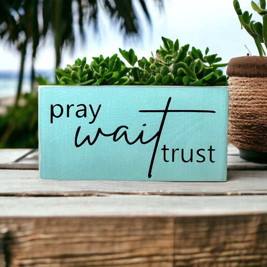 "pray wait trust" wood sign