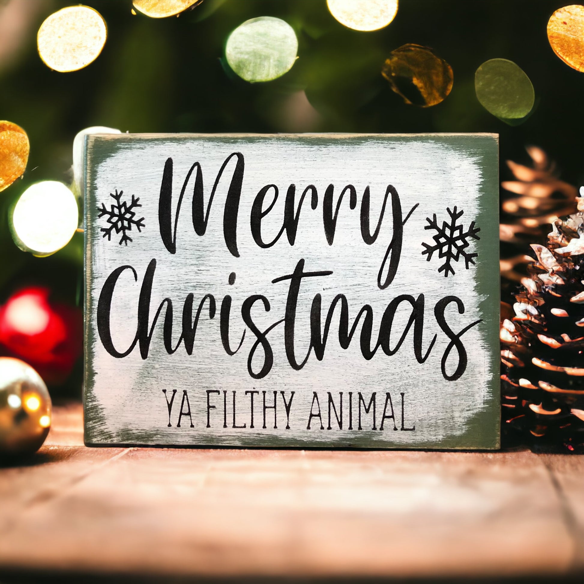 "Merry Christmas ya fillthy animal" wood sign