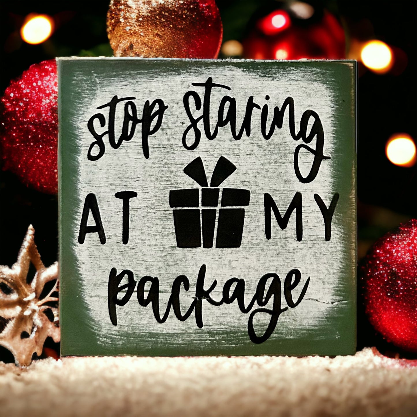 "staring at my package" wood sign