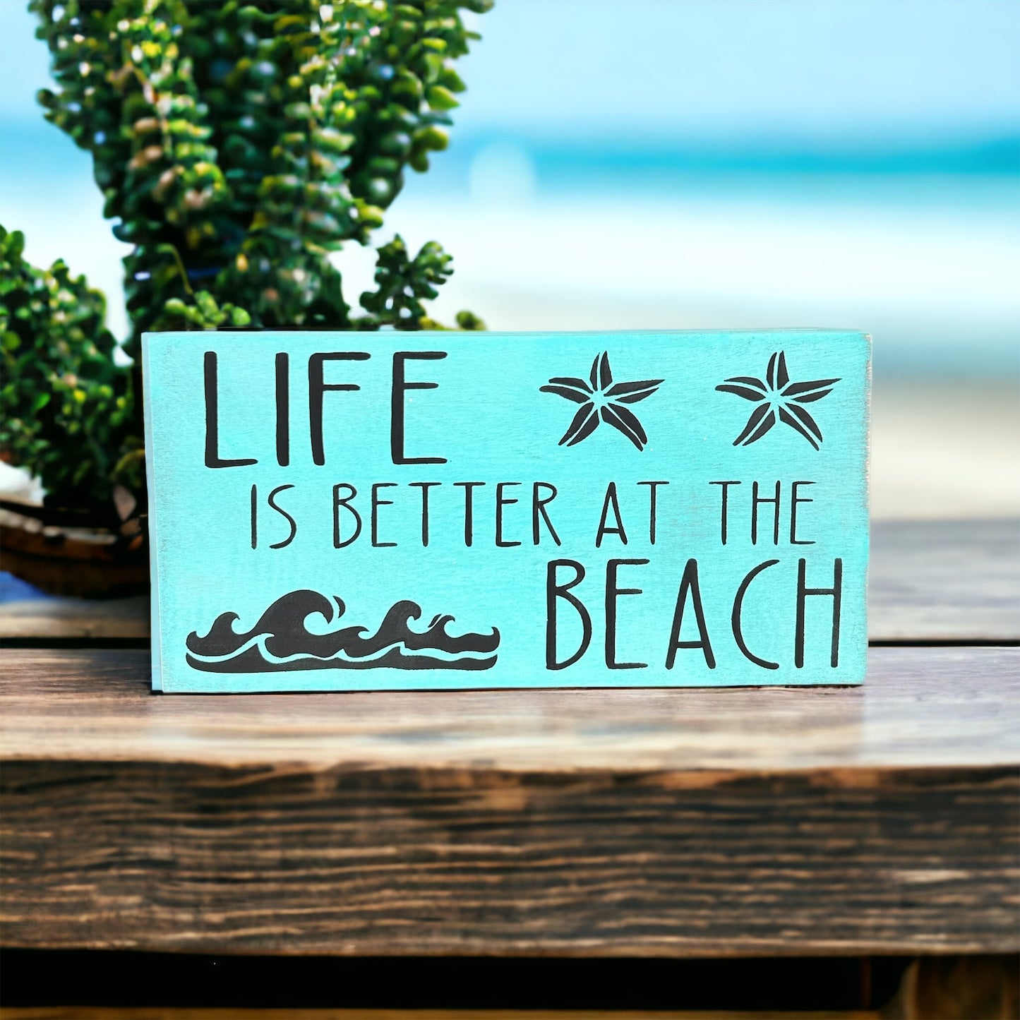 "Life is better at the beach" wood sign