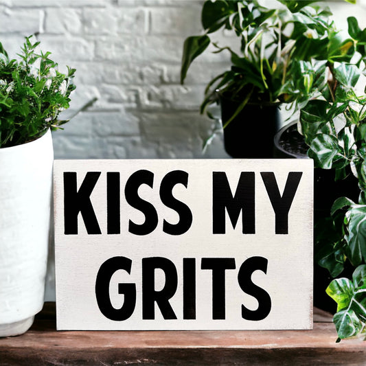 "Kiss my grits" wood sign
