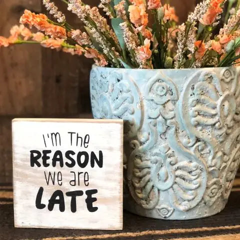 "reason we are late" wood sign