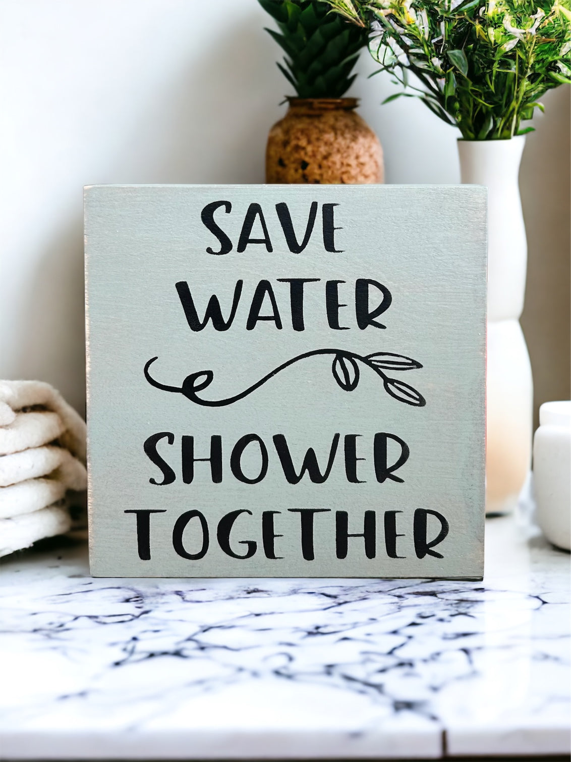 "Save water shower together" funny wood sign