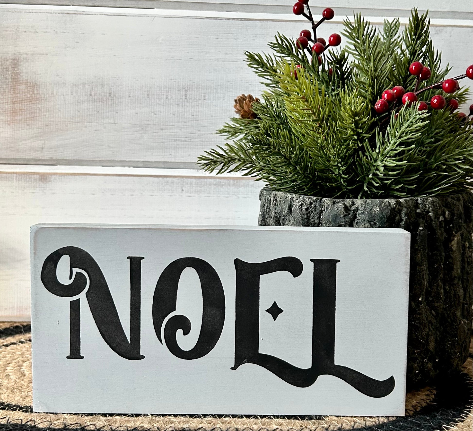 "Noel" wood sign