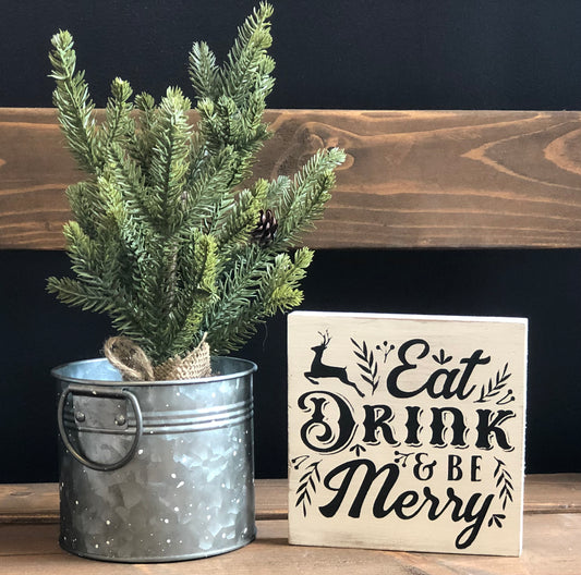"Be merry" wood sign