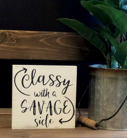 "Classy with a savage side" wood sign