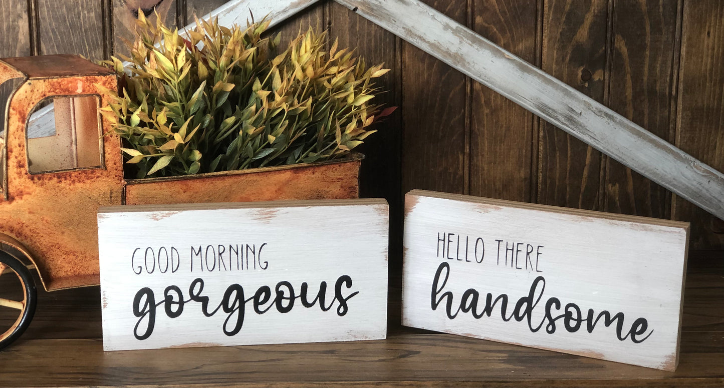 "Hello handsome" and "Hello gorgeous" wood signs