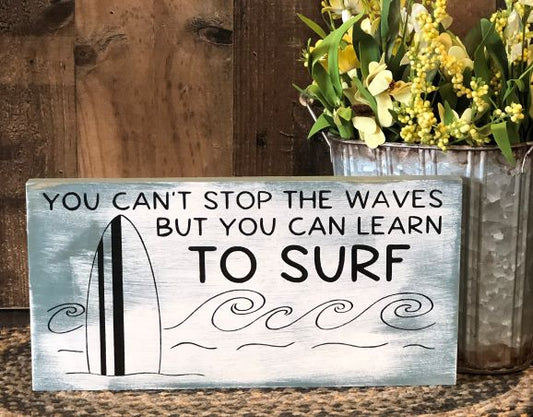 "Learn to surf" woof sign
