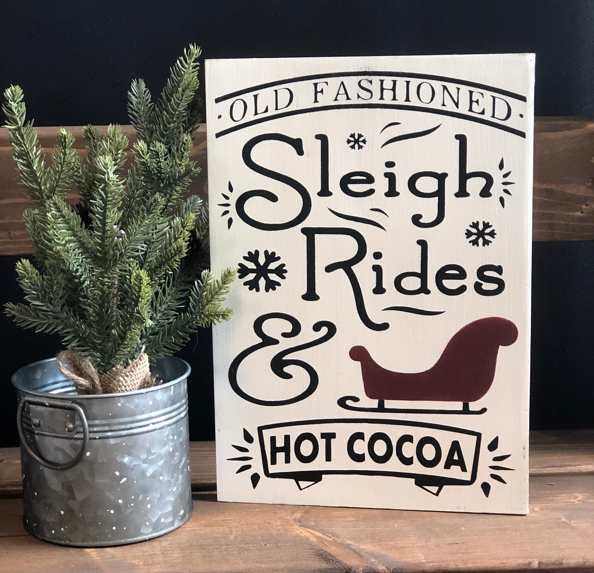"Sleigh rides" wood sign