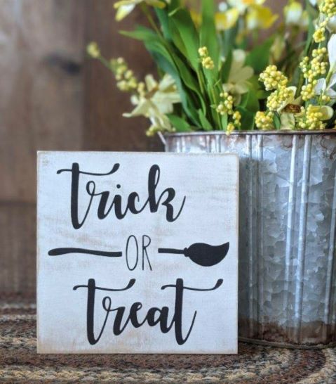 "Trick or treat" wood sign