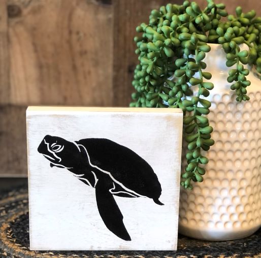 Black and white turtle sign